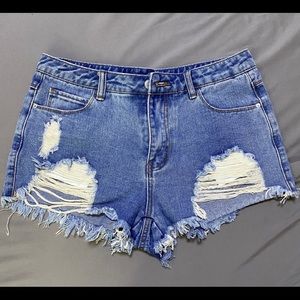 Distressed denim shorts